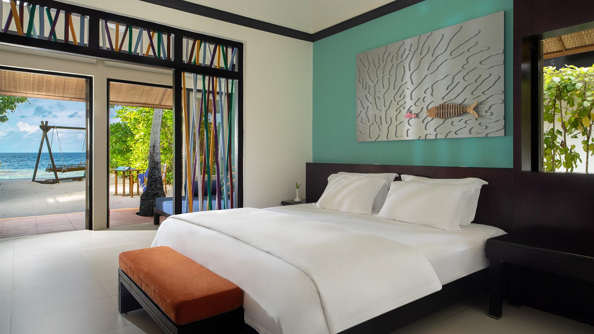 Dh-Ihuru-Accommodation-Beachfront-Rainmist-Bedroom
