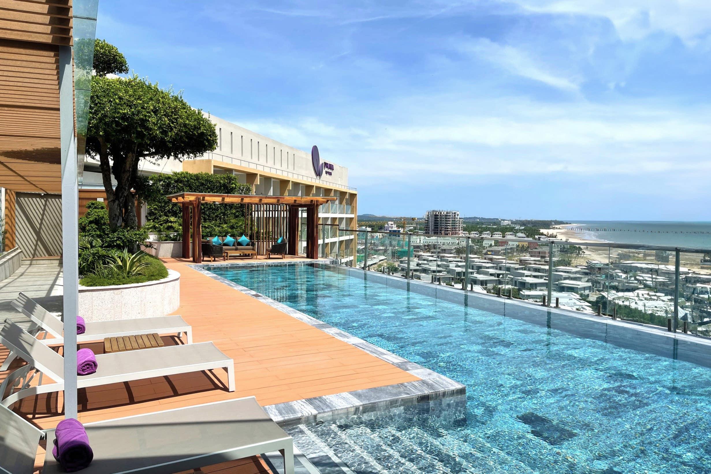 A high-class outdoor pool and deck inside the stella sky suite